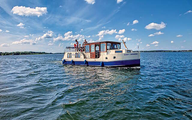 Familie auf einer Kormoran