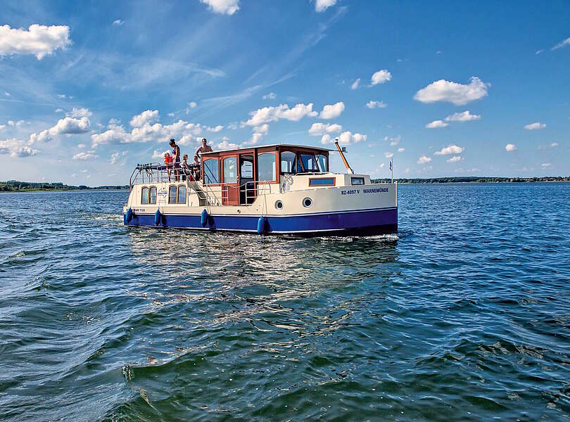 Familie auf einer Kormoran