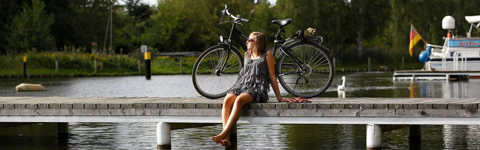 Radlerpause am See,
        
    

        Foto: TMB-Fotoarchiv/Dirk Hasskarl