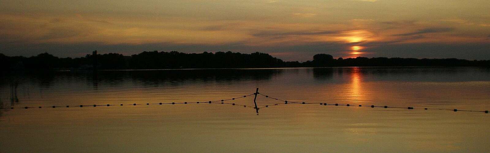 Abendstimmung in Wustrau,
            
        
                Picture: Tourismusverband Ruppiner Seenland e.V./Judith Kerrmann