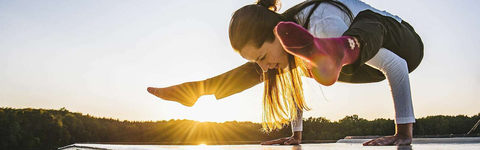 Yoga bei Sonnenaufgang,
            
        
                
                
                    Foto: Madlen Krippendorf