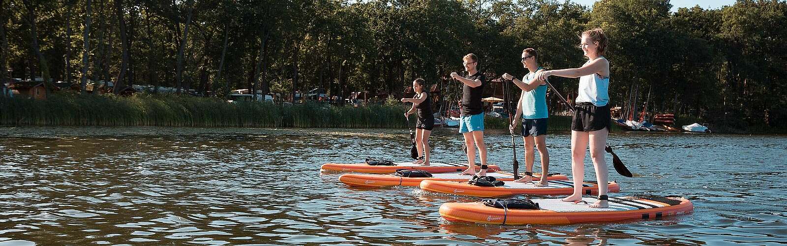 Mit SUP-Boards auf dem Templiner See,
            
        
                Foto: TMB Tourismus-Marketing Brandenburg GmbH/Steffen Lehmann